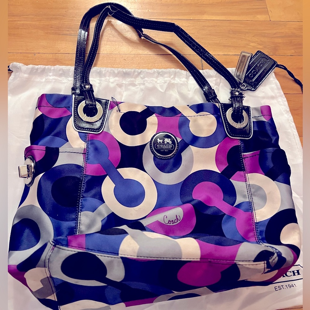 COACH purse with black leather straps